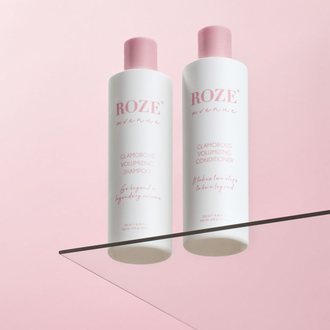 szampon i odżywyka Roze Avenue - glamorous volumizing shampoo i conditioner ustawione obok siebie na szklanej półce