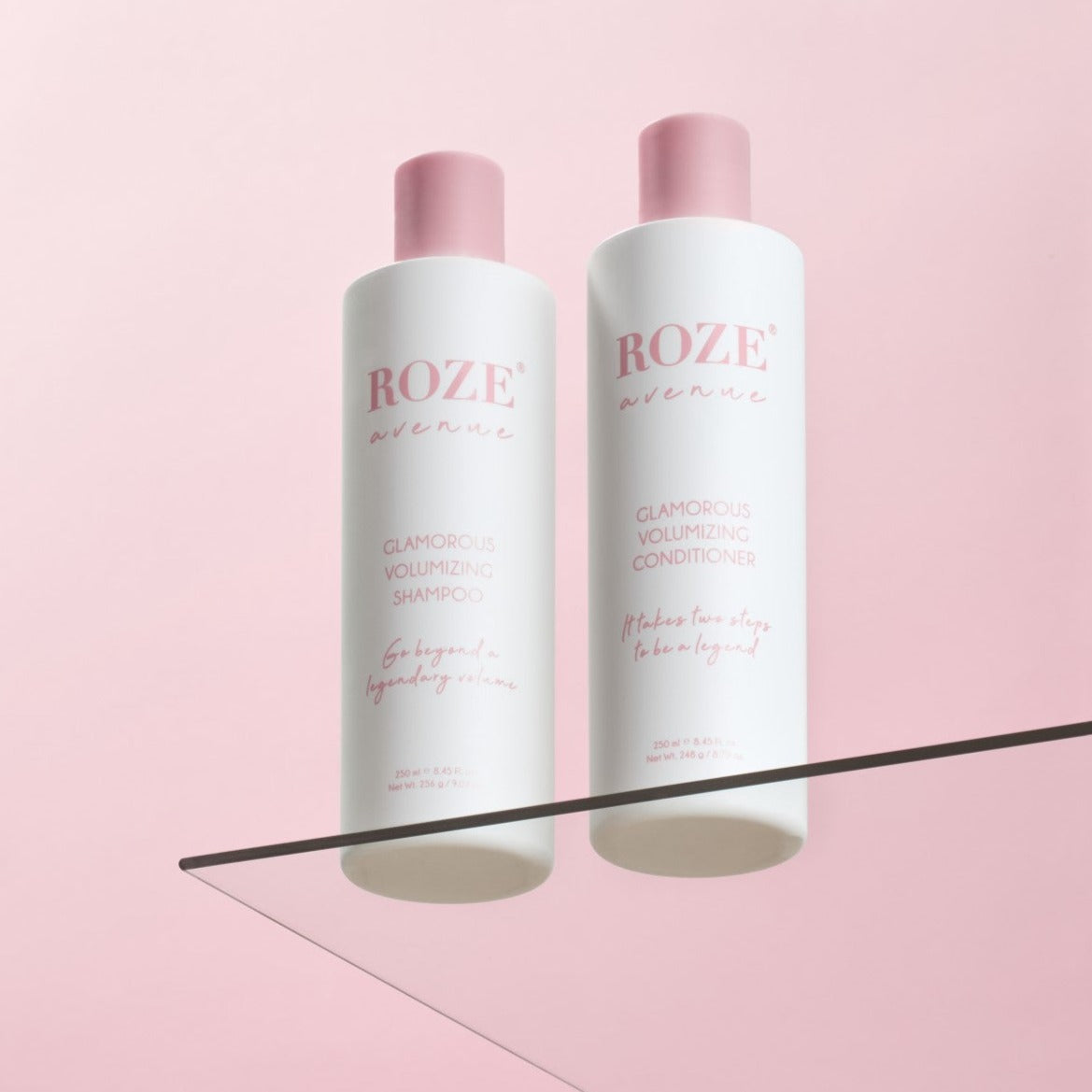 szampon i odżywyka Roze Avenue - glamorous volumizing shampoo i conditioner ustawione obok siebie na szklanej półce